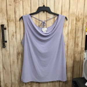 Light lavender sleeveless top.